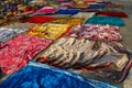 Colorful cloths dry in the sun along the Yamuna river in Agra, Uttar Pradesh, India