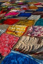 Colorful cloths dry in the sun along the Yamuna river in Agra, Uttar Pradesh, India