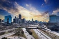 Colorful clouds over Atlanta skyline. Colorful clouds over Midtown Atlanta from Centennial Park Royalty Free Stock Photo