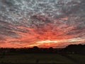 Colorful clouds at sunrise background centered