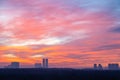 colorful cloudscape over city park and towers Royalty Free Stock Photo