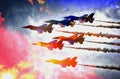 Colorful Cluster of Air Force Jets Flying in the Clouds - teamwork!