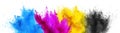 Colorful CMYK cyan magenta yellow key holi paint color powder explosion print concept isolated white background