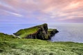 Colorful coastal sunset at Neist Point Lighthouse on Isle of Skye in Scotland, United Kingdom Royalty Free Stock Photo