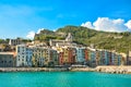 The colorful coastal village of Porto Venere, Italy, on the Ligurian coast, with it`s sidewalk cafes, shops and marina Royalty Free Stock Photo