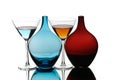 colorful cocktail drinking glasses and blue red special bottles Royalty Free Stock Photo