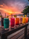 Colorful cocktails on the beach at sunset. Summer vacation concept. Siesta. Evening aperitif. Tropical background. relaxation. gen Royalty Free Stock Photo