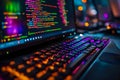 Colorful Code on a Laptop at Night Royalty Free Stock Photo