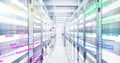 Colorful coding text image over data servers in modern data center Royalty Free Stock Photo