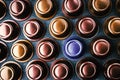 Colorful coffee capsules on the dark table top view Royalty Free Stock Photo