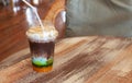 Colorful cold mixed cocoa on wooden table