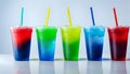 Colorful cold slush drinks in plastic cups. Vibrant and icy refreshing beverages Royalty Free Stock Photo