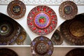 Colorful Collection of Uzbekistan National Souvenir Plates on Shelf