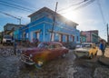 Colorful Colonial ancient town with classic car, building, intersection, cobblestone street in Trinidad, Cuba, America.