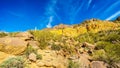 Colorful Colorful Yellow and Orange Geological Layers of Usery Mountain surrounded by Large Boulders, Saguaro and other Cacti