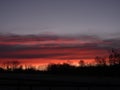 Colorful blue, pink and orange sunset clouds over FingerLakes Royalty Free Stock Photo