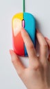 Colorful computer mouse hand clicking vibrant close up vertical modern playful Royalty Free Stock Photo