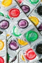 Colorful condoms background Royalty Free Stock Photo