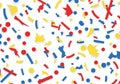 Colorful confetti pattern featuring red, blue, and yellow geometric Royalty Free Stock Photo