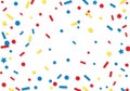 Colorful confetti pattern on a white background, featuring red, Royalty Free Stock Photo