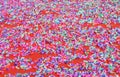 Colorful confetti on red carpet Royalty Free Stock Photo