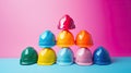 Colorful construction helmets arranged in a pyramid on vibrant background Royalty Free Stock Photo