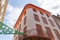 Colorful corner building in Aude city of Carcassonne in France