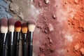 Colorful cosmetics on rock, top view with space for text, realistic style for vibrant visuals