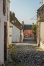 Colorful Cottage at the End of a Cobbled Street in Culross, Fife, Scotland Royalty Free Stock Photo