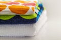 Colorful cotton bath towels on white background Royalty Free Stock Photo