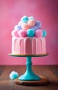 Colorful cotton candy cake with fluffy balls on top on teal-colored stand on wooden surface against pink background. Royalty Free Stock Photo