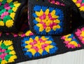 Colorful cotton granny square. Crochet texture close up photo Royalty Free Stock Photo