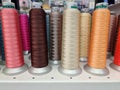 colorful cotton yarn on spool, multi-colored spools for use in loom Royalty Free Stock Photo