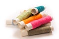 Colorful cotton yarns on rolls for sewing. Thread spools used in fabric and textile industry Royalty Free Stock Photo