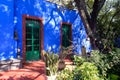 Colorful courtyard at the Frida Kahlo Museum in Mexico City Royalty Free Stock Photo