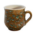 Colorful covered with glaze ceramic handmade mug. Isolated on a