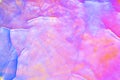 Colorful cracked ice texture. Iridescent holographic colors
