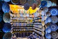 Colorful crafts shop with ceramic art on a traditional moroccan market in medina of Fez, Morocco, Africa