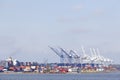 Colorful cranes and containers in new jersey harbor Royalty Free Stock Photo