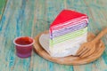 Colorful crape cake on wood table Royalty Free Stock Photo