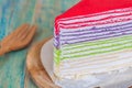 Colorful crape cake on wood table Royalty Free Stock Photo