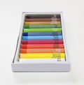 Colorful crayon set with named colors and color codes in perspective