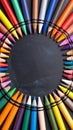 Colorful Crayons Forming Circular Frame on Blackboard for Art Education Design Royalty Free Stock Photo