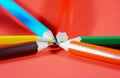 Colorful crayons, pencils with plain paper as a background with structure Royalty Free Stock Photo