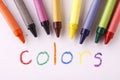 Colorful crayons and the word colors Royalty Free Stock Photo