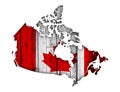 Map and flag of Canada on weathered wood Royalty Free Stock Photo