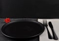 Red rose and table setting on slate Royalty Free Stock Photo