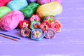 Colorful Crochet Flowers Set. Bright Crochet Flowers, Varicolored Cotton Yarn, Crochet Hooks On Wooden Background With Copy Space