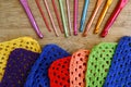 Colorful crochet hooks and granny squares Royalty Free Stock Photo