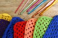 Colorful crochet hooks and granny squares Royalty Free Stock Photo